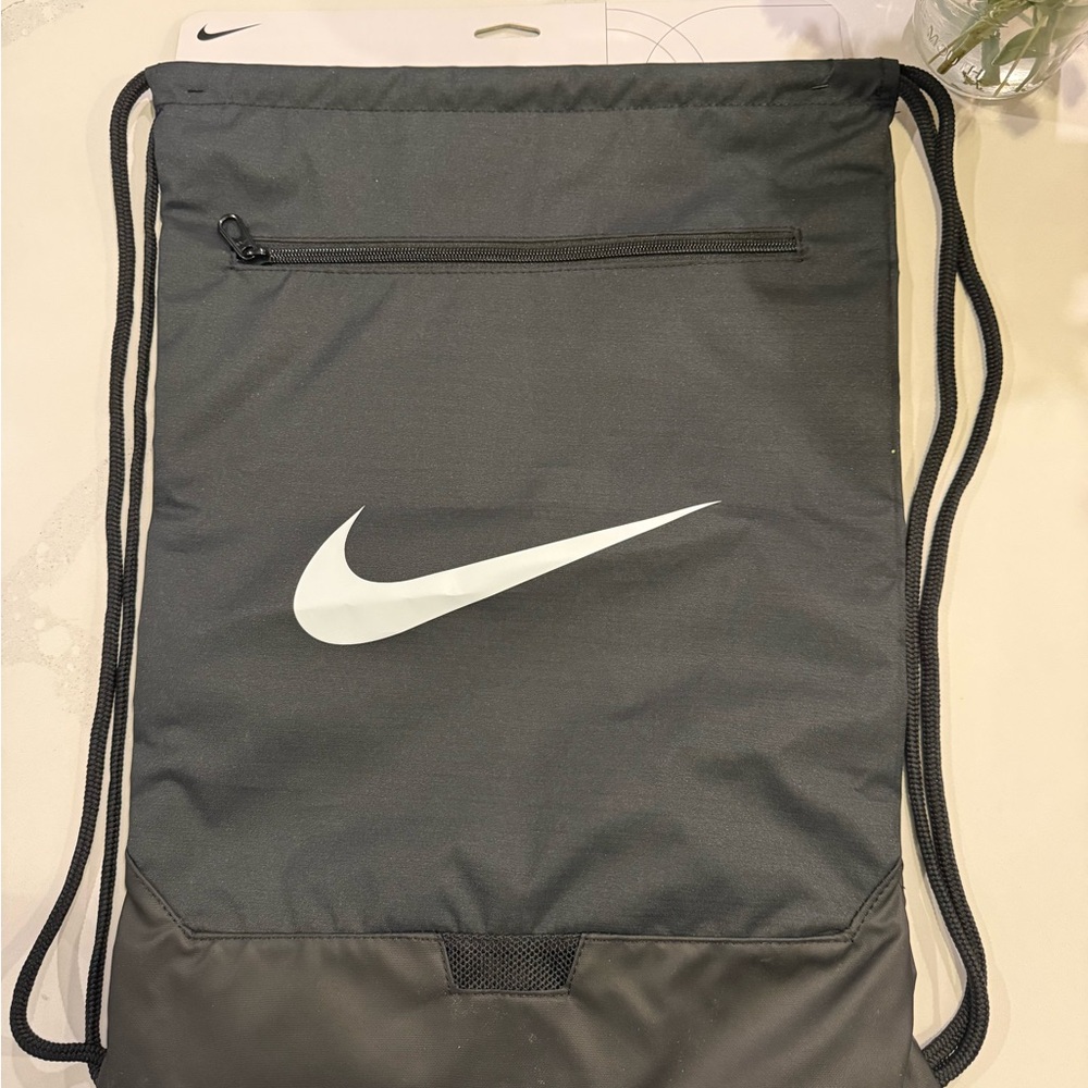Nike Black Drawstring Backpack with White Swoosh